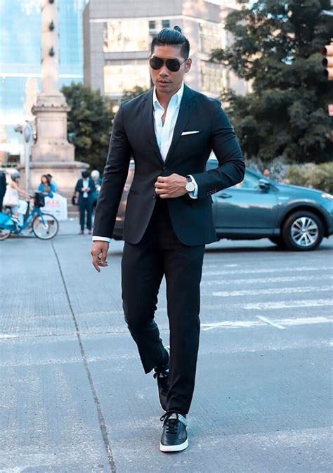 suit and sneakers combination.